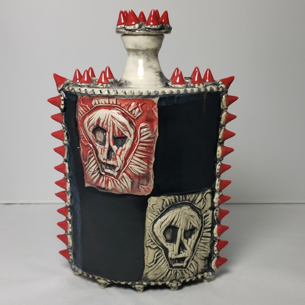 SKULL SPIKES LOTUS HOUSTON CERAMIC POTTERY BOTTLE